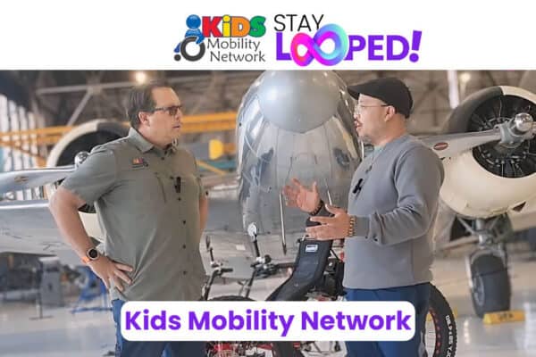 screen shot of video interview with kids mobility network with airplane in background staylooped